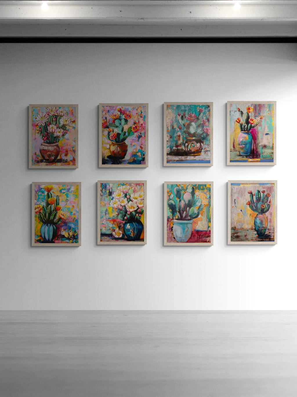Set of colorful paintings on a white gallery wall