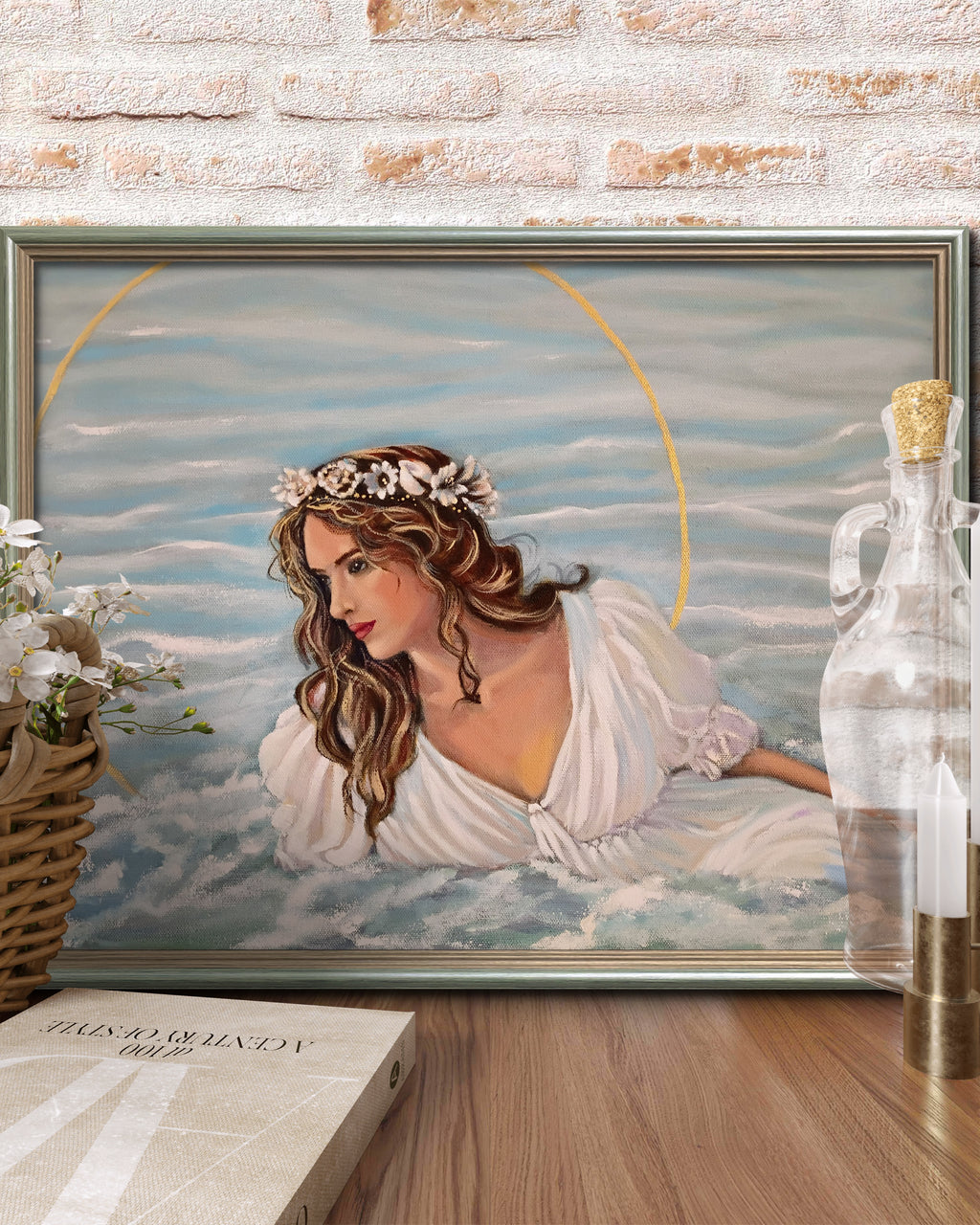 Framed artwork of a woman with a shell crown against a cloudy sky background.