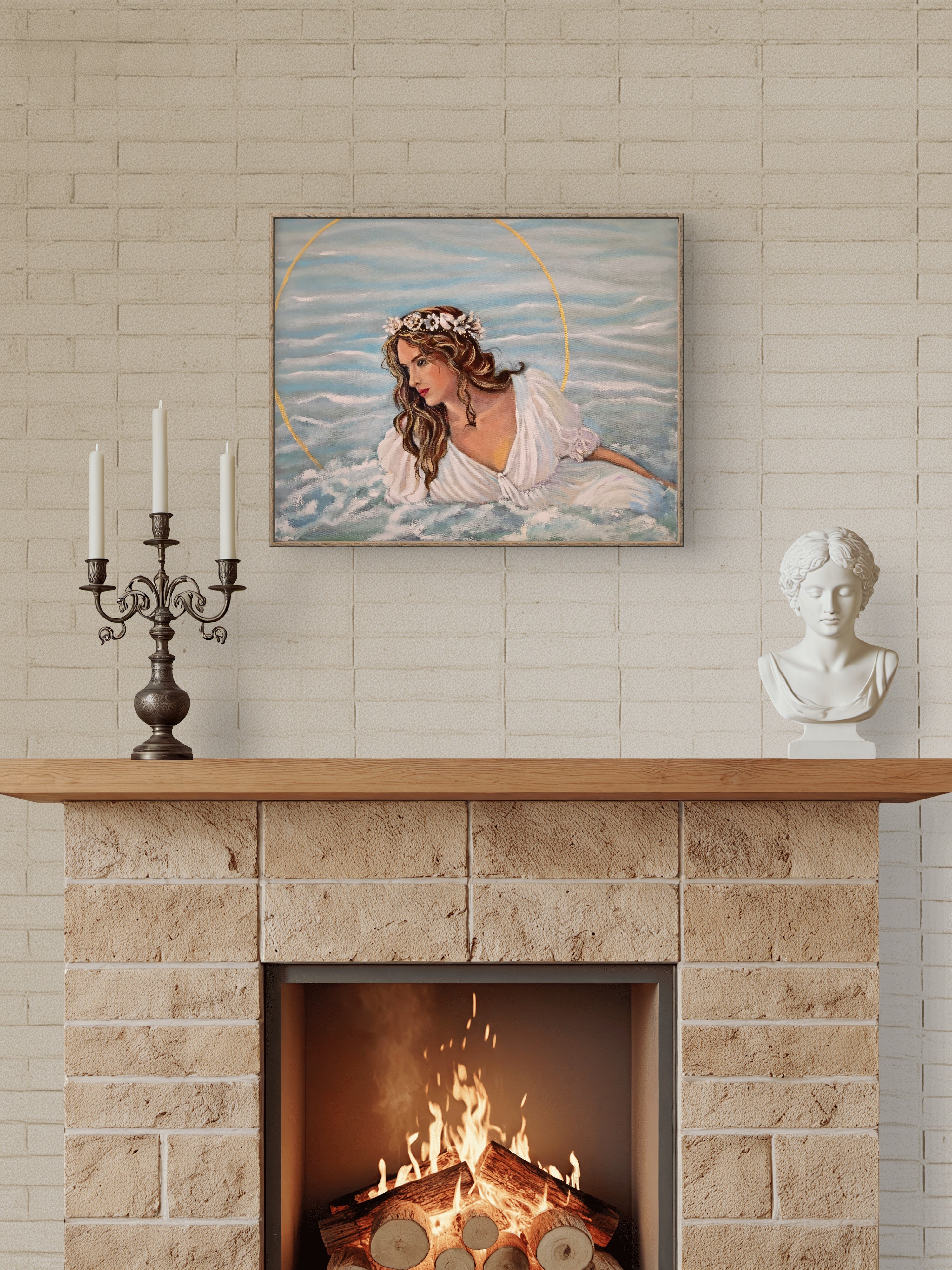 Framed artwork above a fireplace with candles and a bust on a mantelpiece.