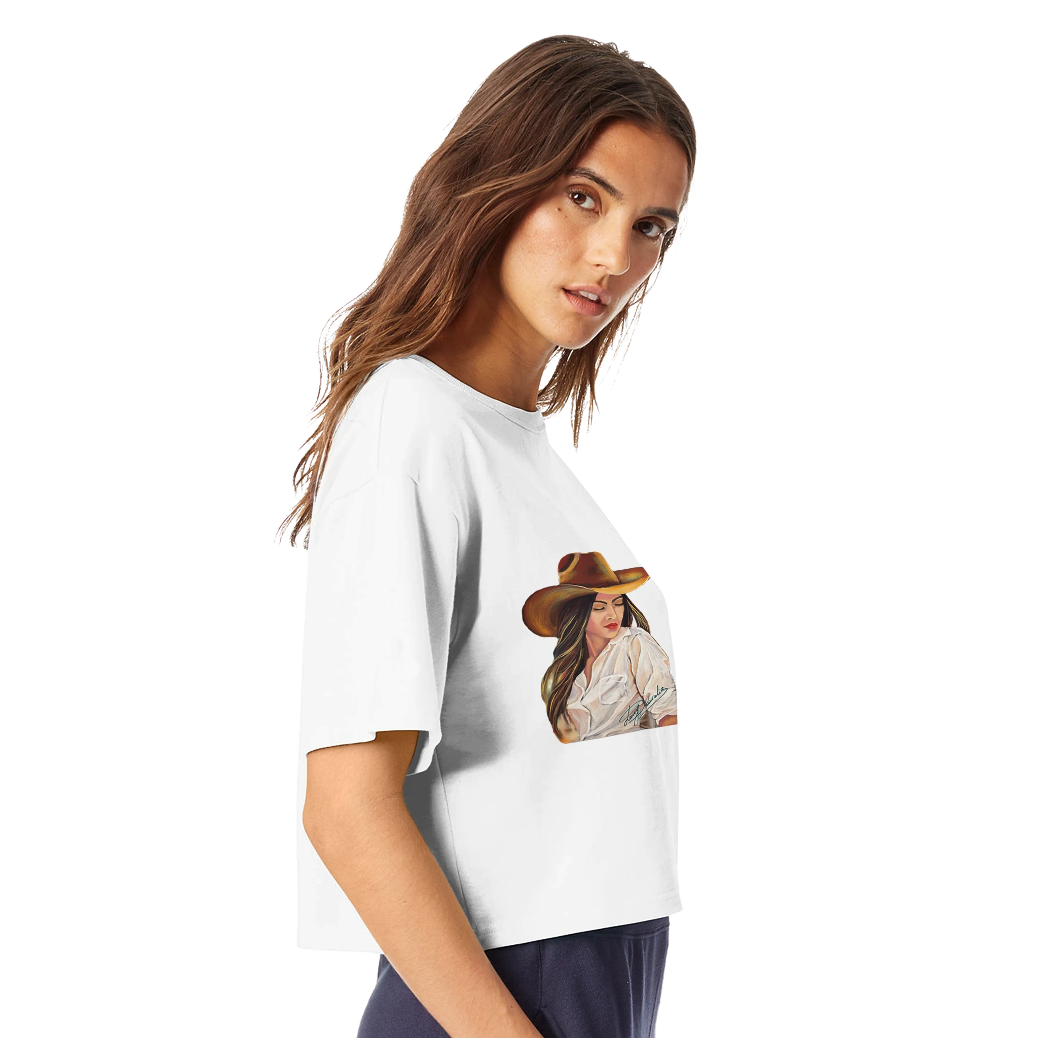 Woman wearing a white t-shirt with a printed image of a woman in a hat and dress.