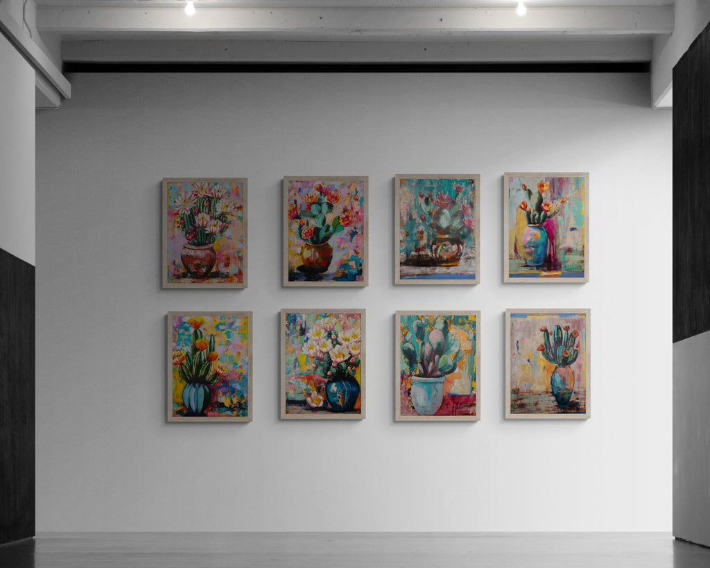 Art gallery with colorful floral and cactus paintings on a white wall.