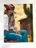 Painting of a person in cowboy attire sitting in front of a wooden cabin with cacti.