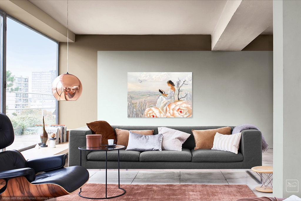 Modern living room with a gray sofa, coffee table, and wall art.