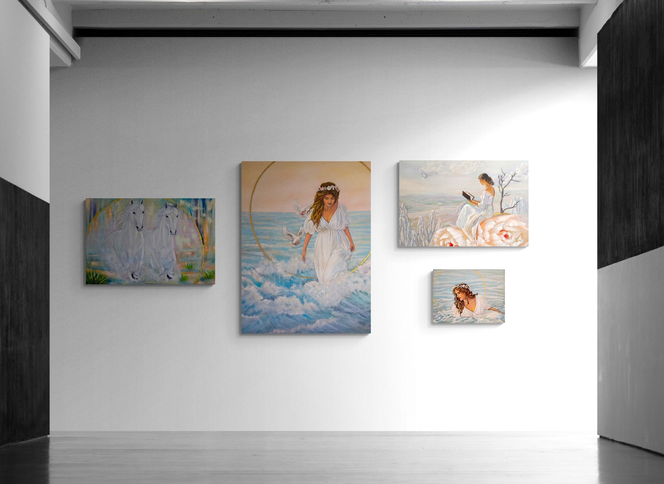Art gallery with various paintings on a white wall
